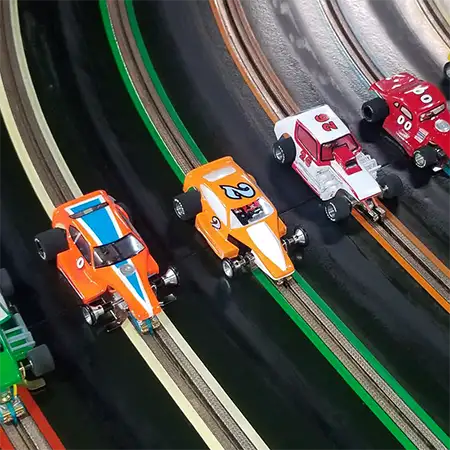 Slot cars on a raceway
